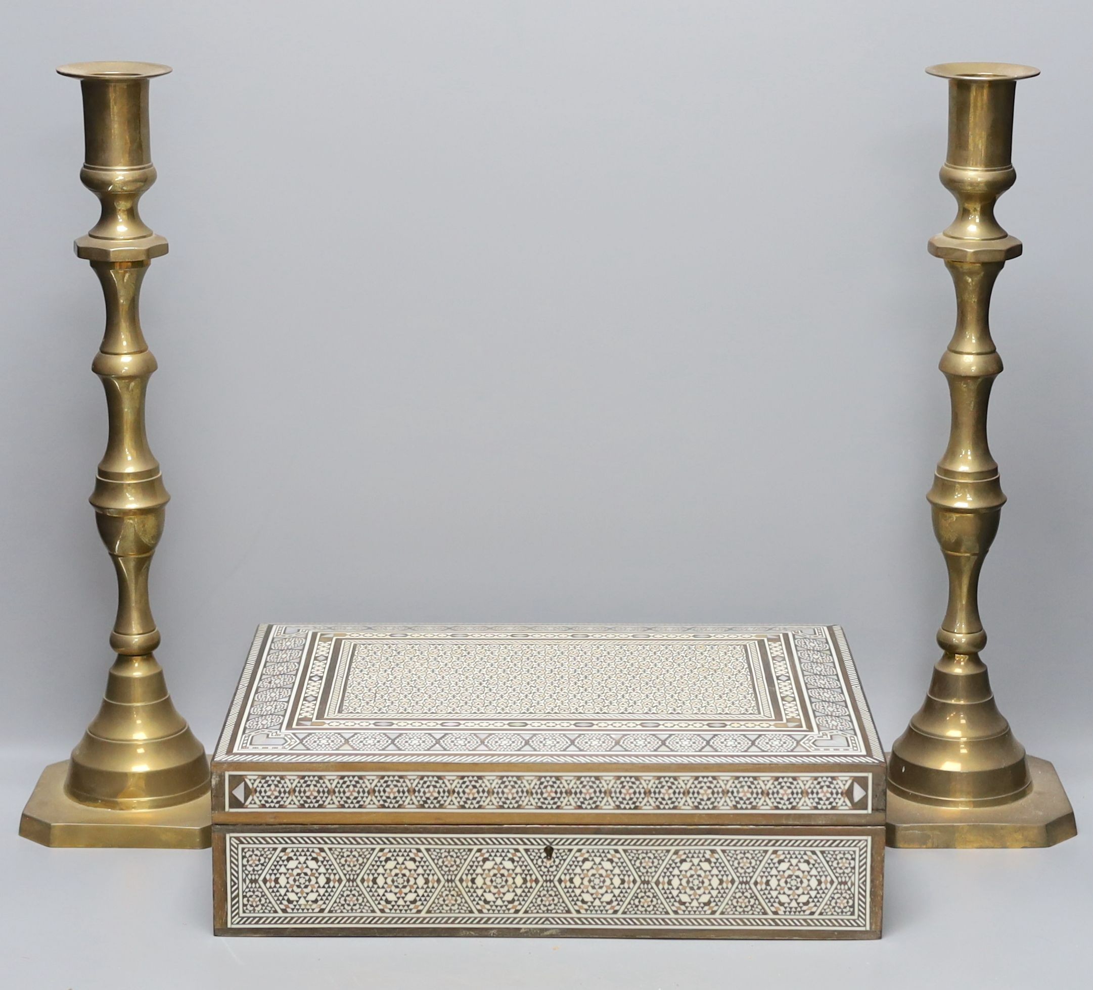 A Damascus jewellery casket and a pair of Victorian candlesticks, 43cm tall